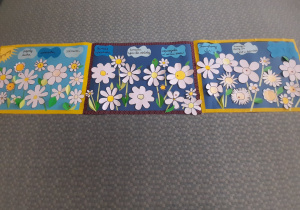 Plakaty przedstawiające wiosenną łąkę wraz z życzeniami dla seniorów.